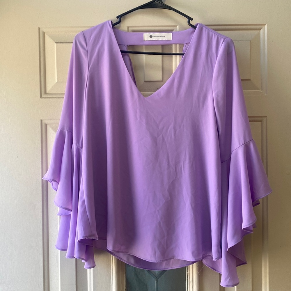 The Impeccable Pig purple open back blouse